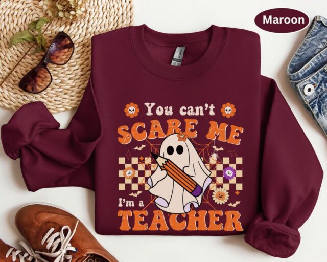 You Can’t Scare Me, I’m a Teacher Halloween Sweatshirt – Funny Ghost Design | Cozy, Durable & Perfect for Spooky School Spirit