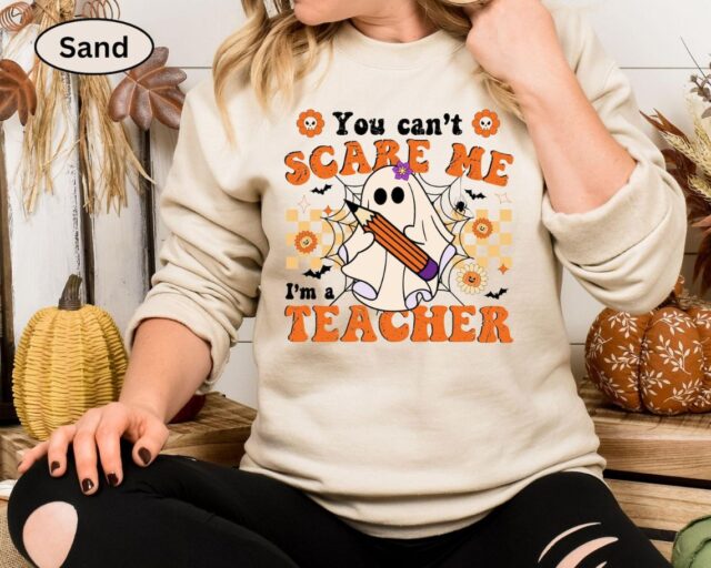 You Can’t Scare Me, I’m a Teacher Halloween Sweatshirt – Funny Ghost Design | Cozy, Durable & Perfect for Spooky School Spirit