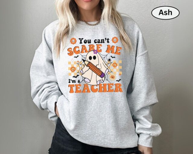 You Can’t Scare Me, I’m a Teacher Halloween Sweatshirt – Funny Ghost Design | Cozy, Durable & Perfect for Spooky School Spirit